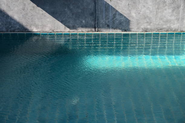 istock blue swimming pool and cement wall, construction industry 1426096152