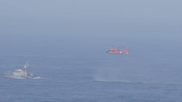 istock US Coast Guard Boat and Helicopter 1426096557