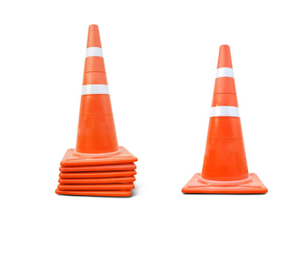 istock Pylon sign Orange and White reflective traffic cone isolated on white background.concept for hazards and safety 1426102591