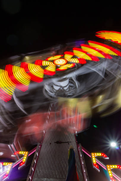 istock Long exposure of carnival rides 1426108534