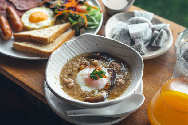 istock Breakfast on the wooden table at the cafe 1426117540