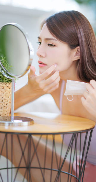 istock asian girl take off mask 1426118331