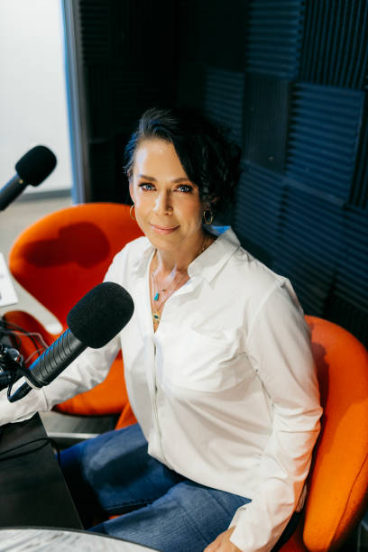 istock Woman works in a radio interview studio 1426118417