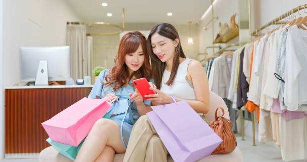 istock asian bestie use phone 1426120534