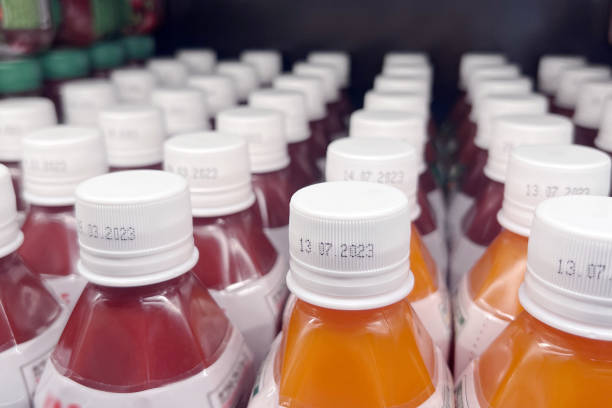 istock Bottles of drinks on supermarket shelf 1426126911