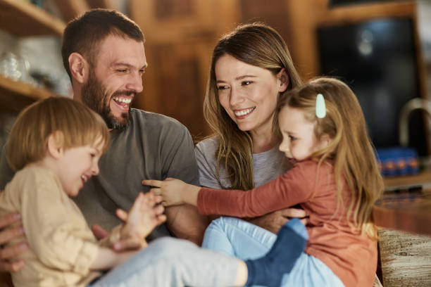 istock Cheerful family having fun while playing at home. 1426138832