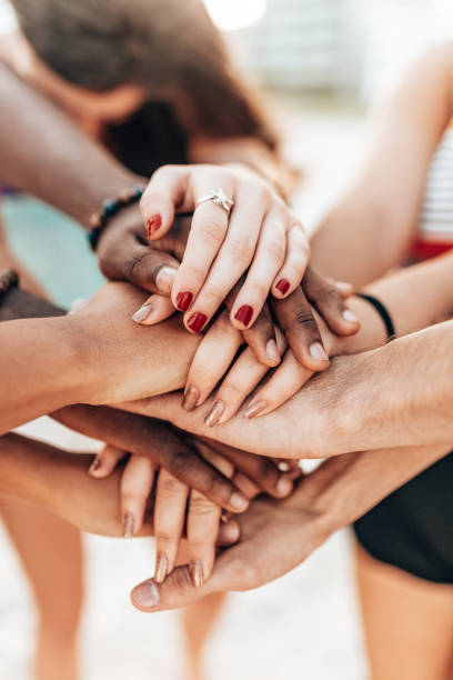 istock stack of hands of friends 1426141430