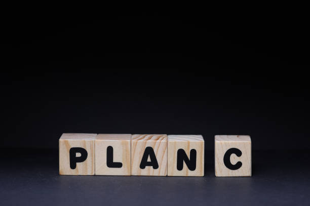 istock Plan word on wooden cubes on black background 1426142220