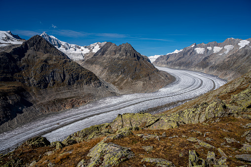 Landscape of glacier, mountain and sky. Aletsch Glacier in Swiss Alps. Bettmeralp, Valais Canton, Switzerland.