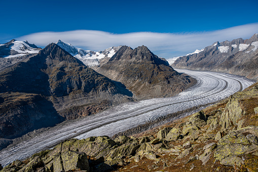 Landscape of glacier, mountain and sky. Aletsch Glacier in Swiss Alps. Bettmeralp, Valais Canton, Switzerland. Travel destinations.