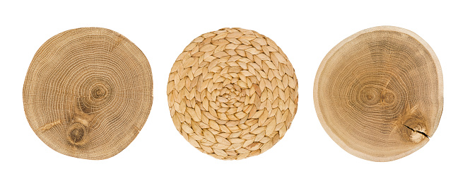 Round woven and wooden place mats isolated on white background