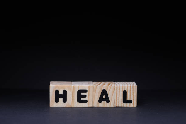 istock Heal word on wooden cubes 1426144613