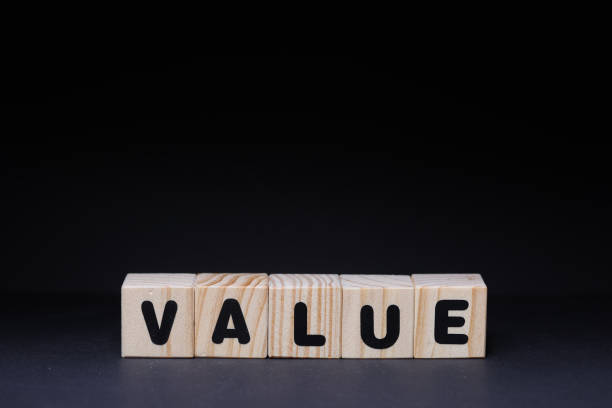 istock Value word on wooden cubes on black background 1426144618