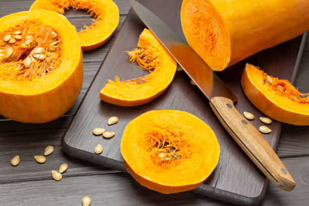 istock Knife, pumpkin slices on a cutting board. 1426151776