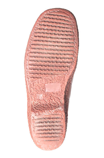 istock brown sole of rubber boots isolated on white background. 1426152223