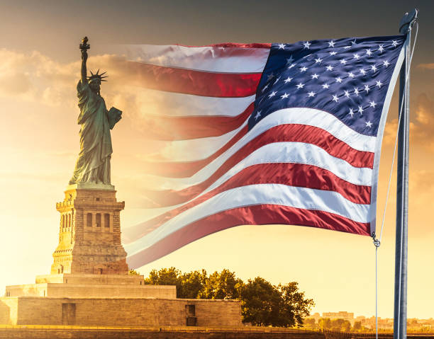 istock statue of liberty with us flag 1426155498