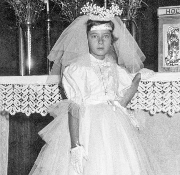 istock Girl at First Communion, 1957. 1426155629