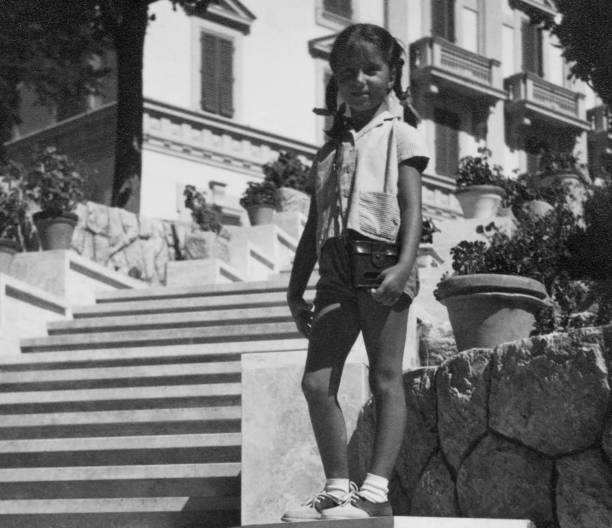 istock Little girl on staircase, 1952. 1426158589