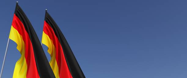 istock Two flags of Germany on flagpoles on side. Flags on a blue background. Place for text. Berlin, Munich. Europe. Commonwealth. 3D illustration. 1426168839