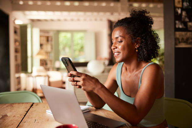 istock A young woman typing an sms on a smartpphone. 1426178272