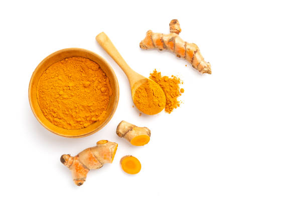 istock Turmeric powder and turmeric root isolated on white background ,Top view 1426179011