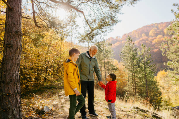 istock With our grandfather in the forest 1426180870