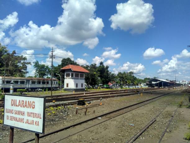 istock Small train station with railroad tracks 1426181108