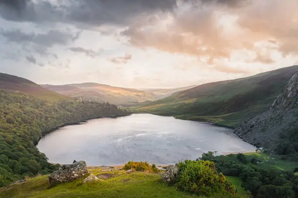 Photo of Dramatic sunset at Lough Tay, called The Guinness Lake located in Wicklow Mountains