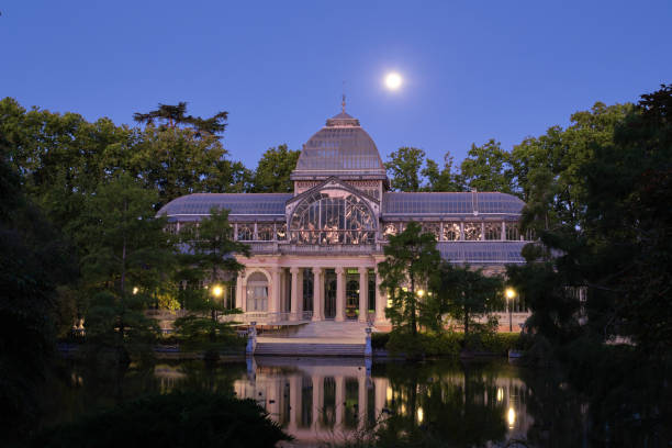 Night view of Crystal Palace in the Buen Retiro Park. Madrid, Spain Night view of Crystal Palace in the Buen Retiro Park. Madrid, Spain. Palacio de cristal. palacio de cristal photos stock pictures, royalty-free photos & images
