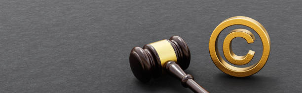 istock Judge's Gavel on Dark Background with  Copyright Symbol 1426193952