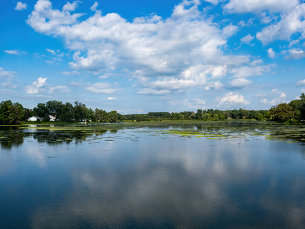 Looking across Lake Strum from the bridge on a summer afternoon. - Strum, Wisconsin.