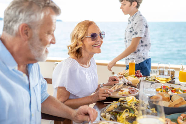istock Family having lunch on deck 1426197889