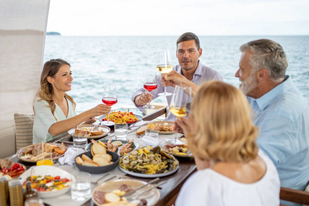 istock Family having lunch on deck 1426198050