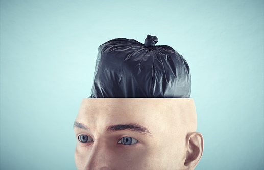 Man with half head and a trash bag inside. Negative mindset and toxic relationship concept. This is a 3d render illistratioin