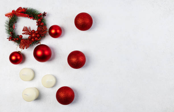 istock Red Christmas Balls with candles on a light background. Selective Focus. Space for copying. view from above. 1426205208