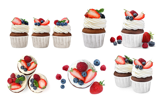 Set with delicious cupcakes on white background