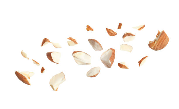 istock Pieces of tasty almonds on white background 1426206908