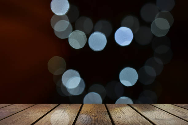 istock 3D rendering,Empty wooden table with Blur Background, for your photo montage or product display, Space for placing items on the table, Mock up for display of product. 1426207026
