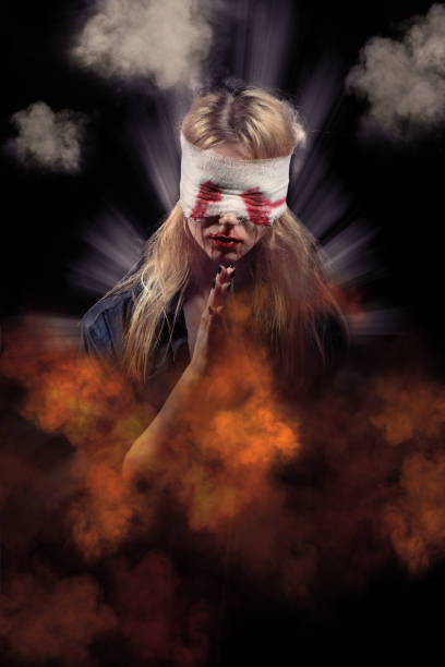 istock sad praying woman 1426212881