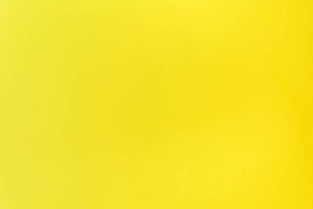 istock Yellow paper background, texture. Can be used for web templates and artwork 1426220792