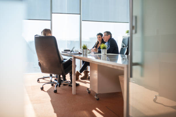 istock Businesspeople Debating Their New Strategy At Office Work Table 1426220962
