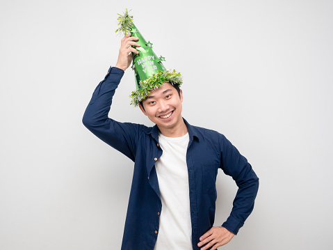 Man cheerful happy smile wearing green hat happy new year concept