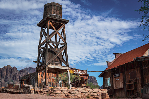 Head frame and buildings at old mining site in Broken Hill, NSW, Australia. This area of Broken Hill is where the mining company BHP was founded in 1885. They mined silver, lead and zinc.