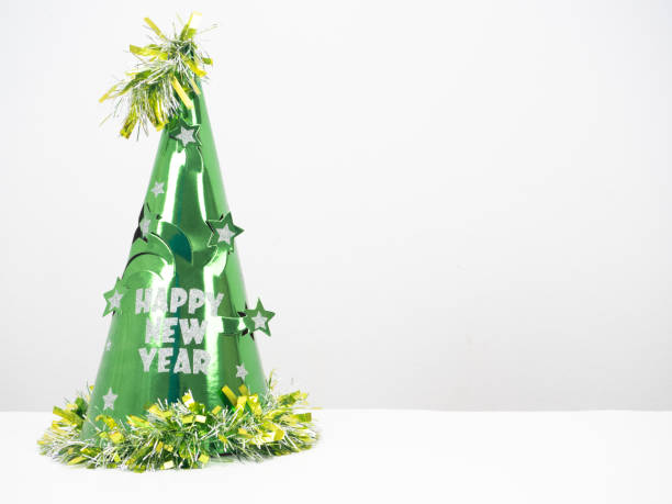 istock New year hat green color on the table white background copy space 1426222818