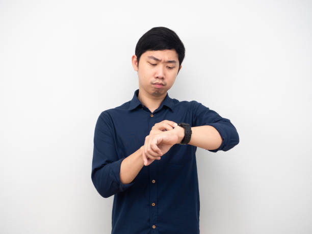 istock Businessman serious emotion looking at his watch 1426224344