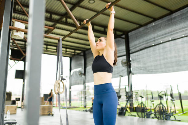 istock Sporty woman preparing to start her cross training workout 1426229137