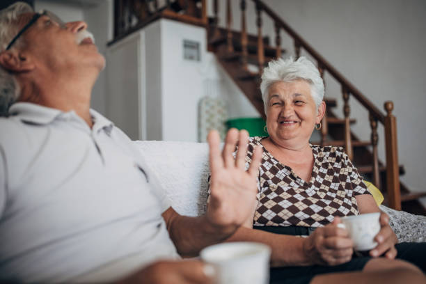 istock Senior married couple drinking coffee at home 1426230344