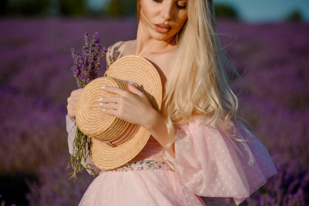istock Young woman in the lavender field 1426231844