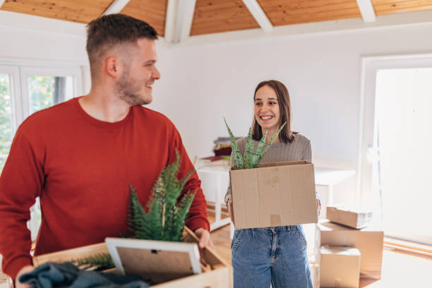 istock Couple moving into new flat 1426232429