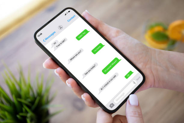 istock woman hands holding phone with app messenger on the screen 1426232905